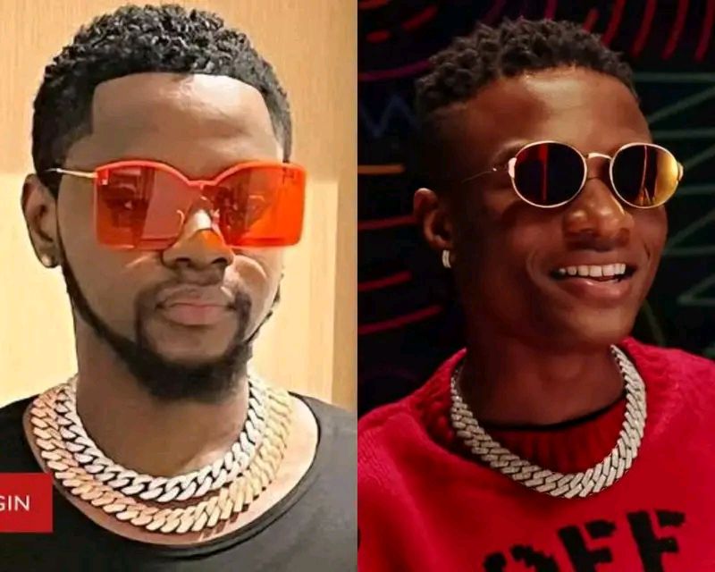 Kizz Daniel blasts troll who advised him to tread carefully around Wizkid