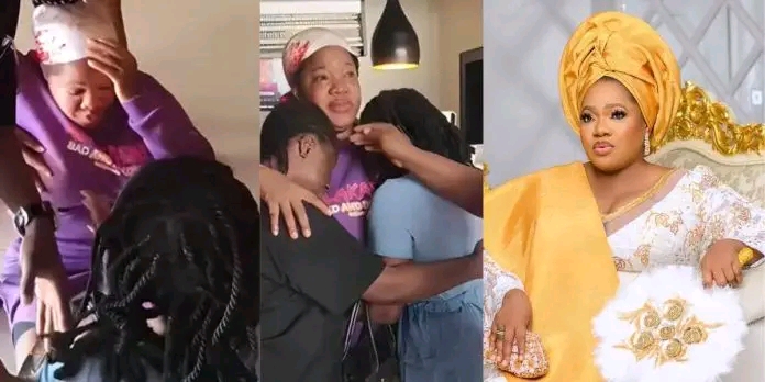 Moment an overzealous fan’s jump onto actress Toyin Abraham during a cinema screening resulted in an embarrassing tumble.